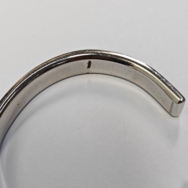 Brazalete metálico plateado DAMIER