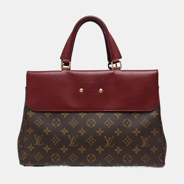 VÉNUS Monogram Coated Canvas Brown