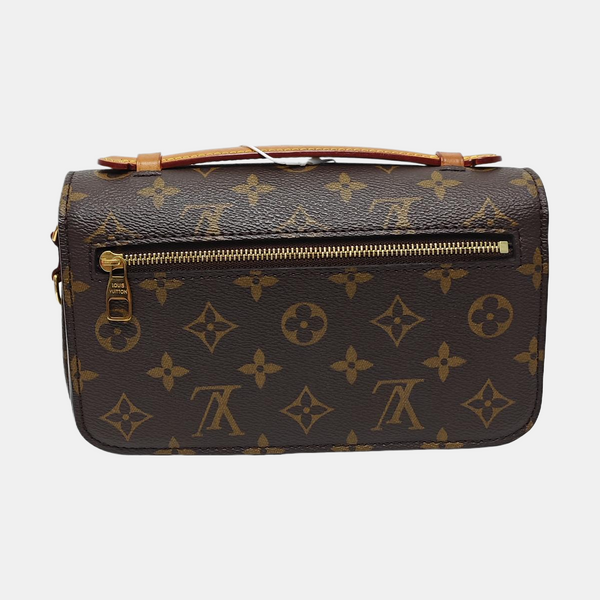 MÉTIS EAST WEST Monogram Coated Canvas Brown