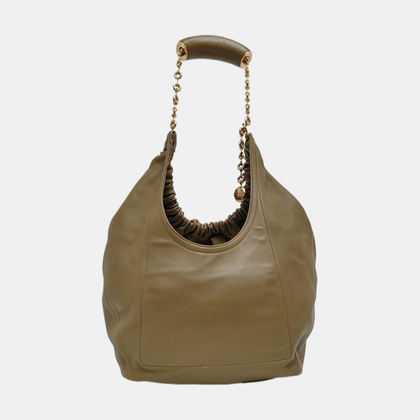 Bolsa Squeeze pequeña de piel de cordero color verde