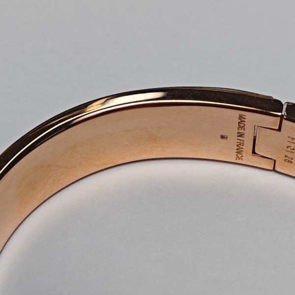 Pulsera Clic H de metal oro rosa