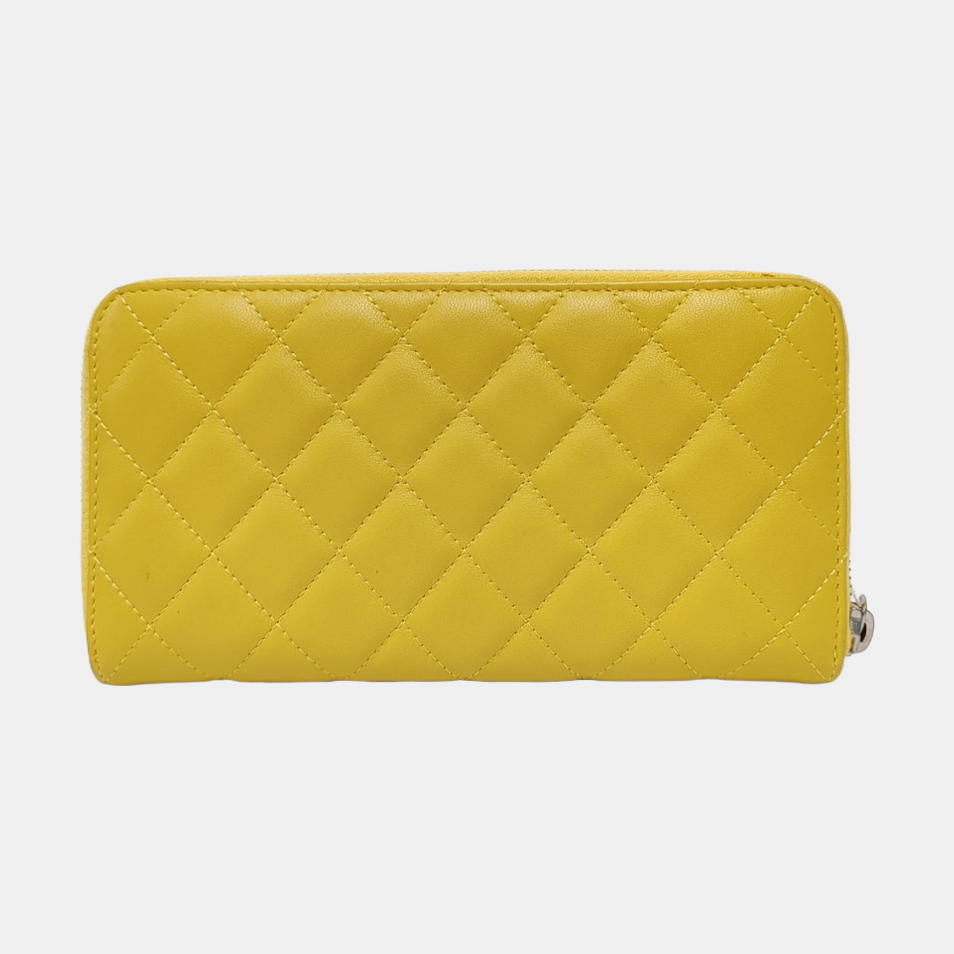Authenticated pre-owned  WOC Quilted Lambskin Yellow Wallet - Wallet at Looply