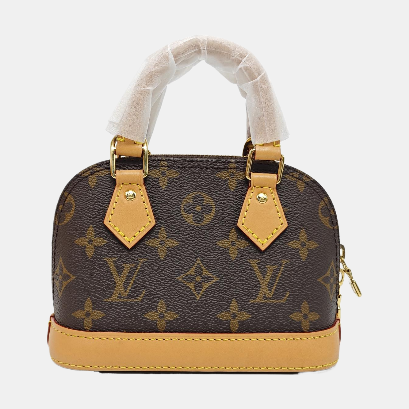 ALMA Mini Monogram Coated Canvas Brown