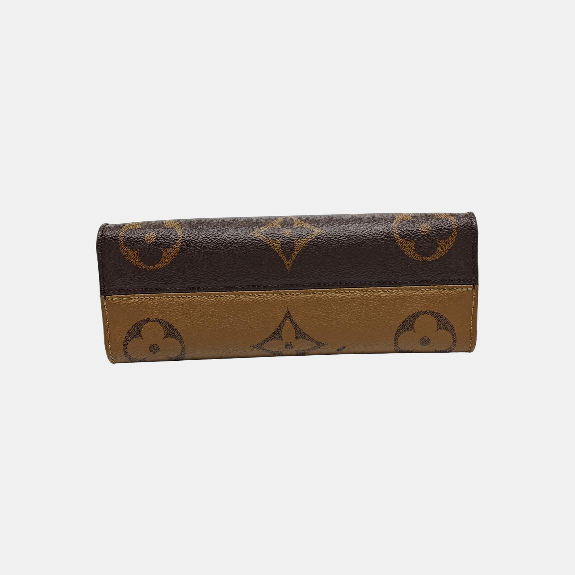 ONTHEGO EAST WEST PM Monogram Coated Canvas Brown