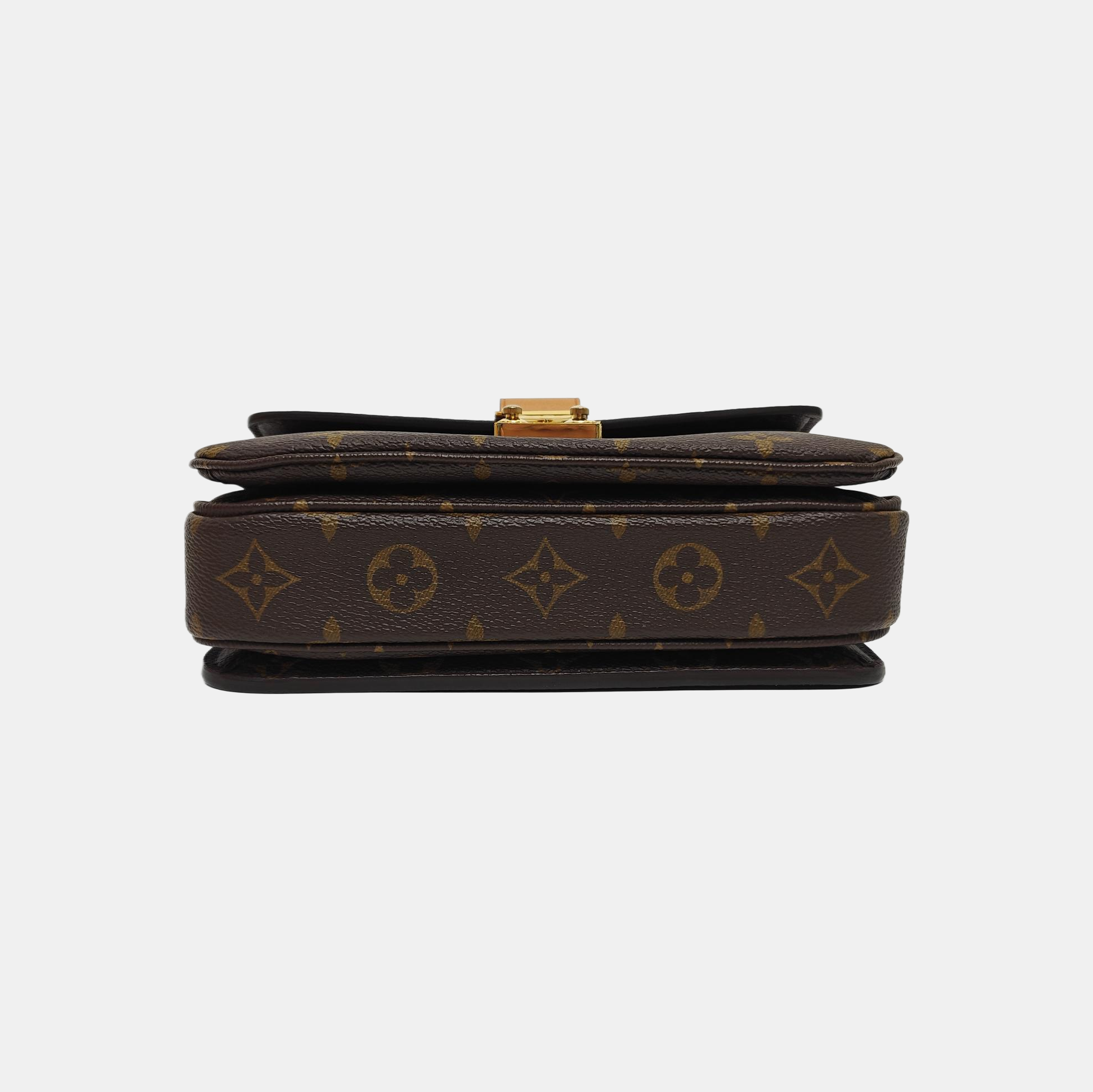 MÉTIS EAST WEST Monogram Coated Canvas Brown