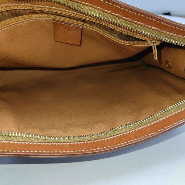 Authenticated pre-owned  MACADAM CLUTCHES Coated Canvas Brown - Clutch at Looply