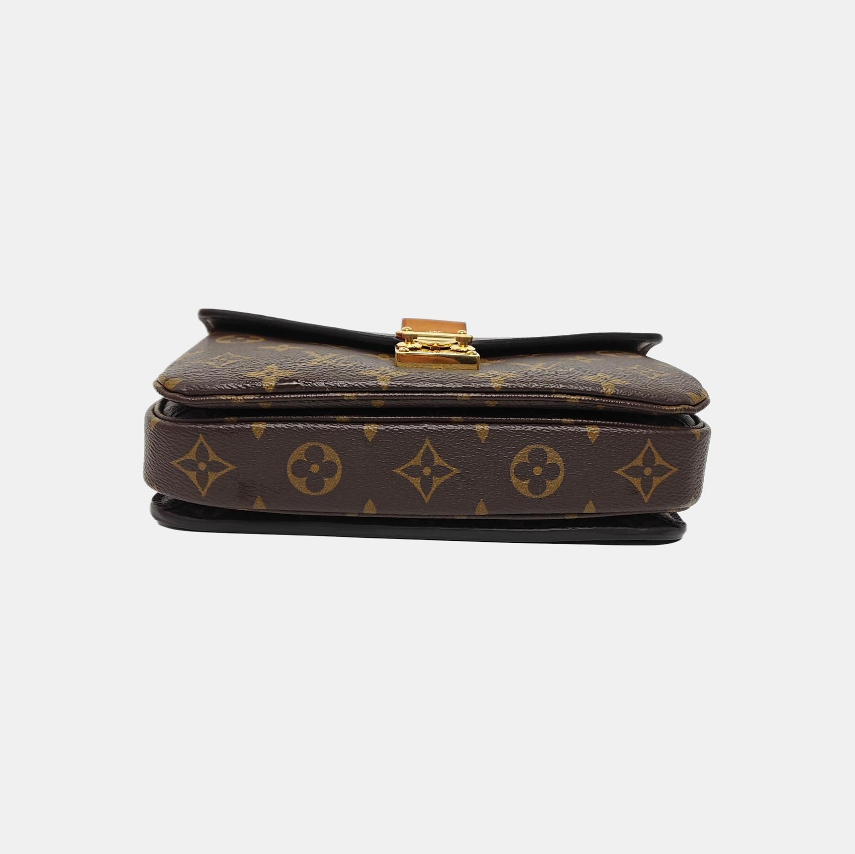 MÉTIS EAST WEST Monogram Coated Canvas Brown