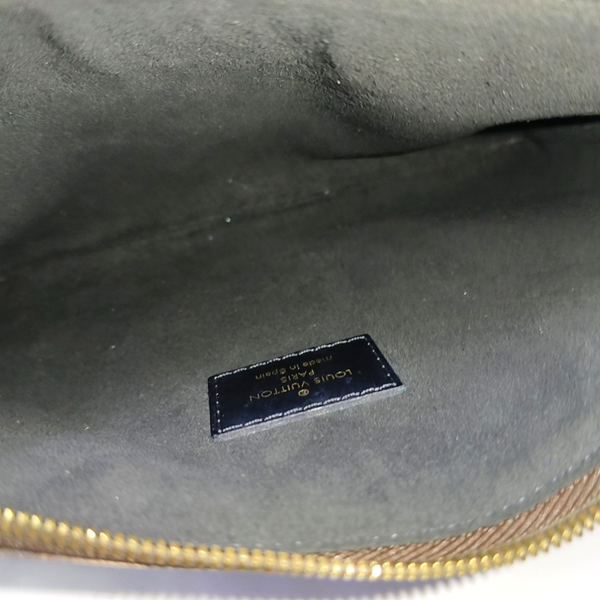 CITY POUCH Monogram Coated Canvas Brown