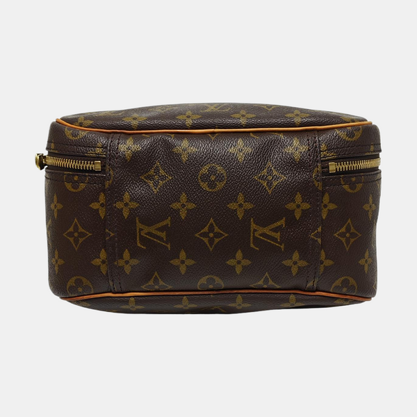 EXCURSION Monogram Coated Canvas Brown