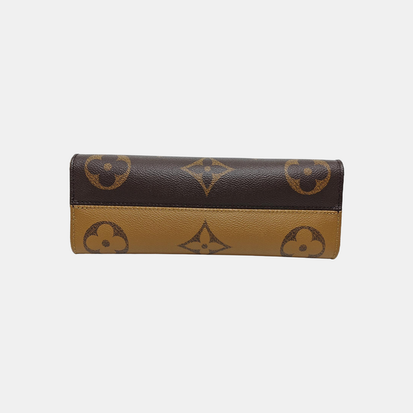 ONTHEGO EAST WEST PM Monogram Coated Canvas Brown