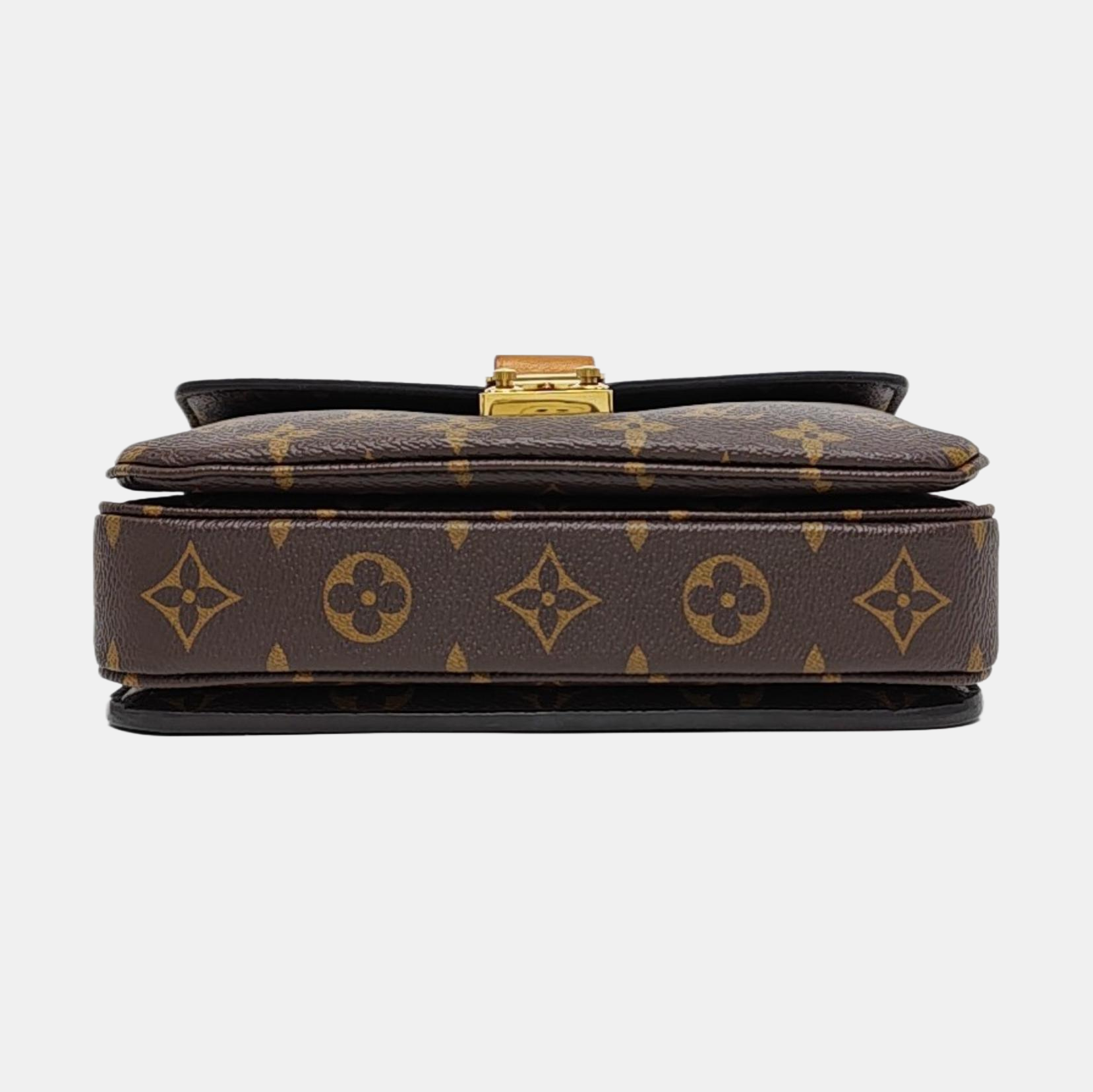 MÉTIS EAST WEST Monogram Coated Canvas Brown