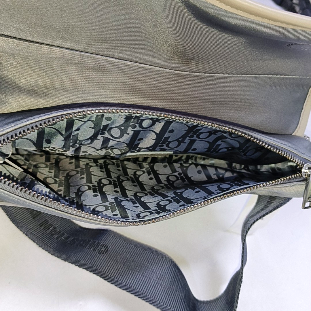 Authenticated pre-owned  Saddle Calfskin Gray - Crossbody Bag at Looply
