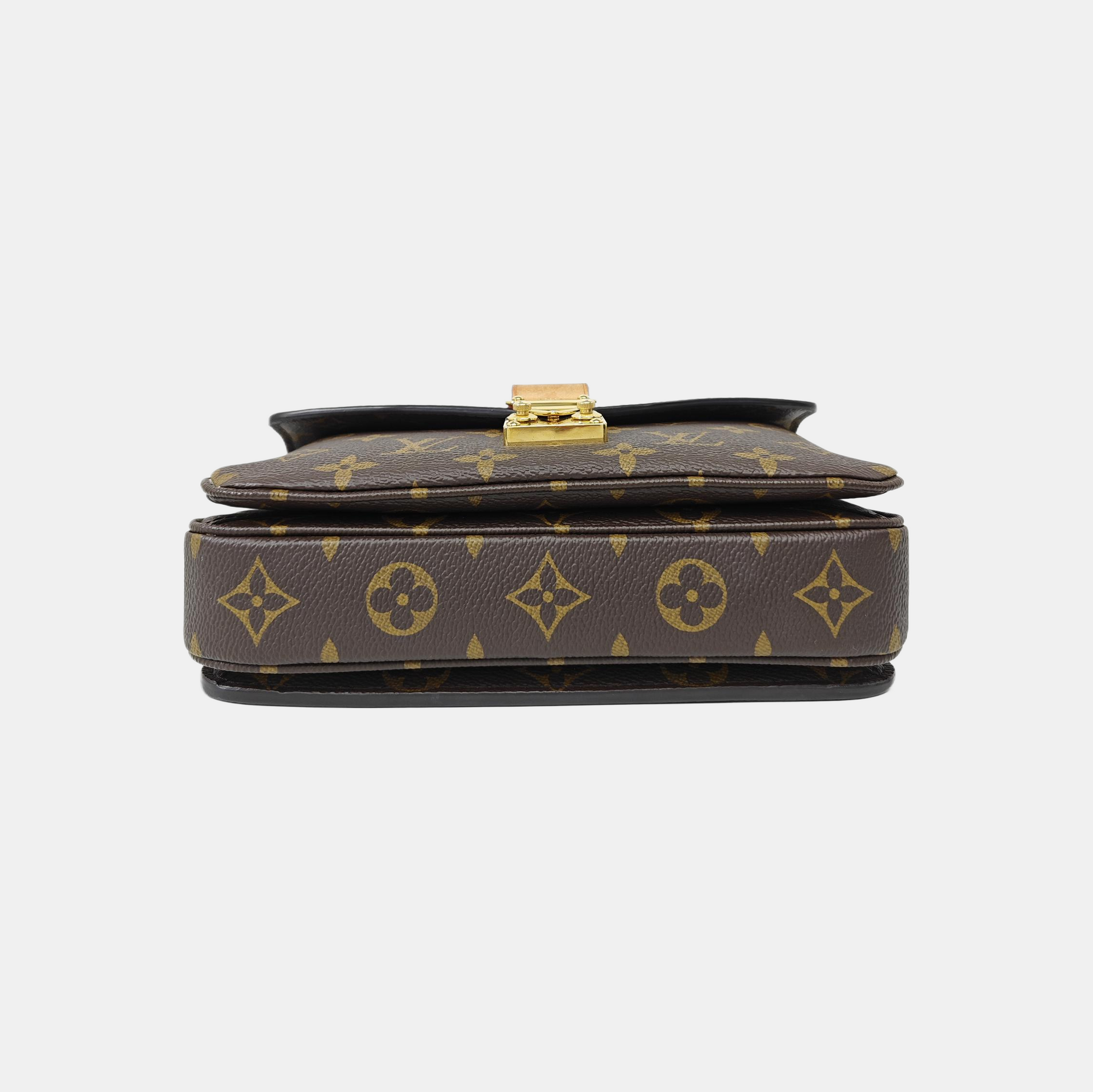 MÉTIS EAST WEST Monogram Coated Canvas Brown