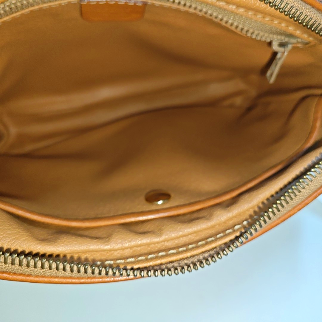 Authenticated pre-owned  MACADAM CLUTCHES Coated Canvas Beige - Clutch at Looply