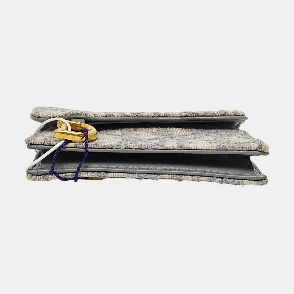 Authenticated pre-owned  Saddle Oblique Fabric Gray Card Holder - Card Holder at Looply