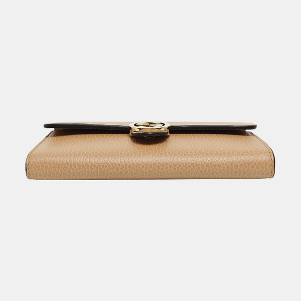 Cartera de piel de becerro marrón con G entrelazadas