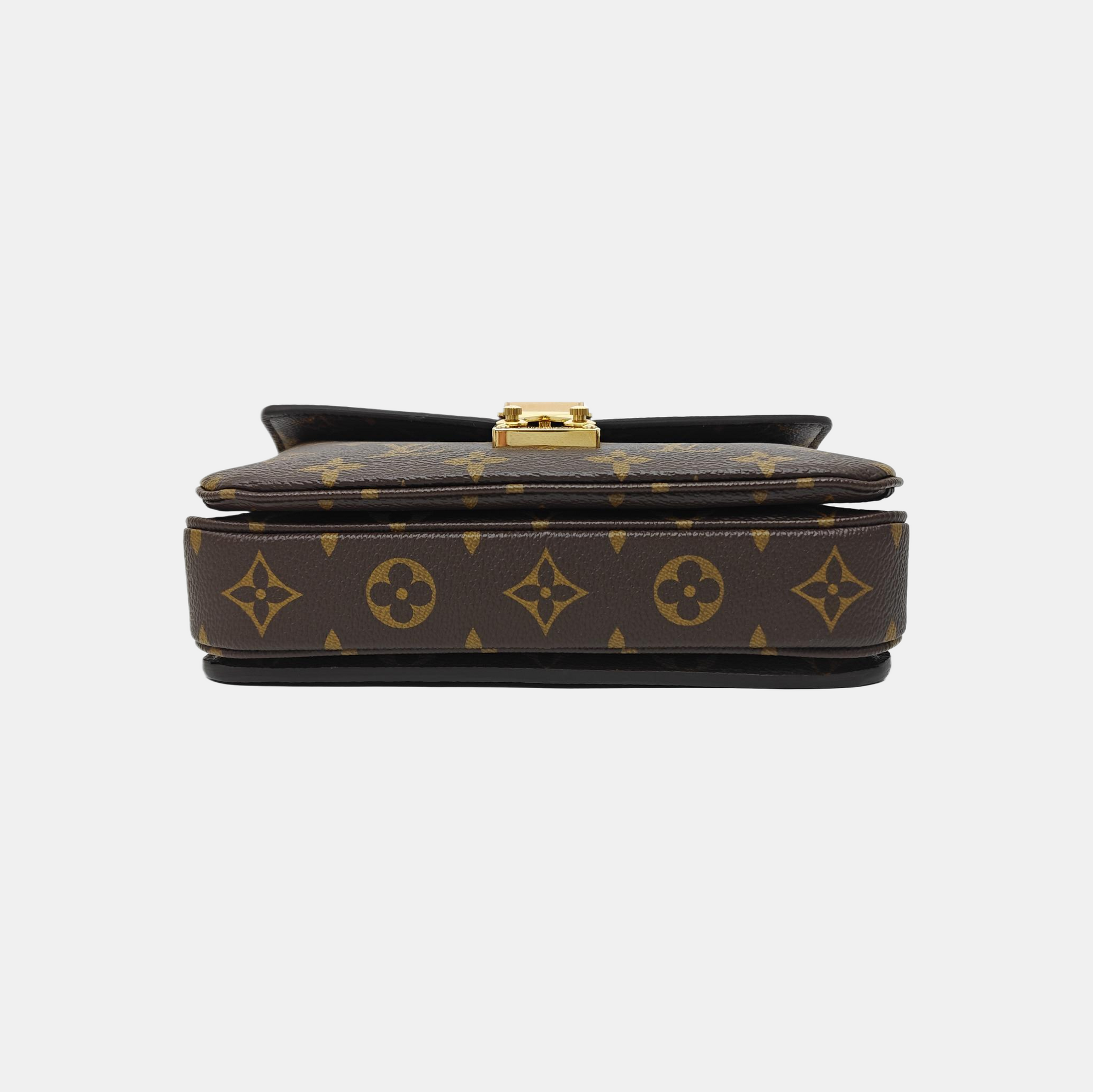 MÉTIS EAST WEST Monogram Coated Canvas Brown