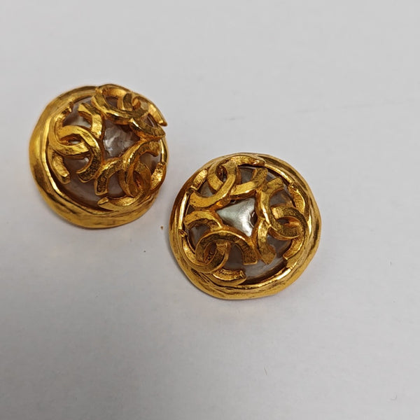Pendientes de clip vintage de metal dorado