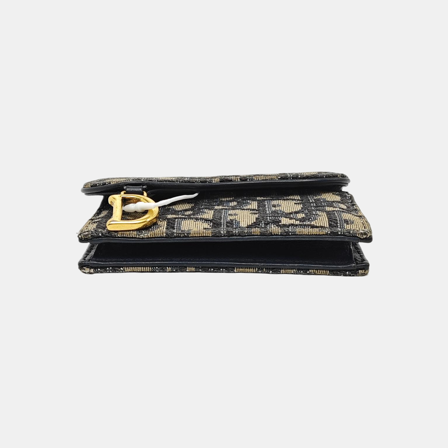 Authenticated pre-owned  Saddle Monogram Canvas Blue Card Holder - Card Holder at Looply