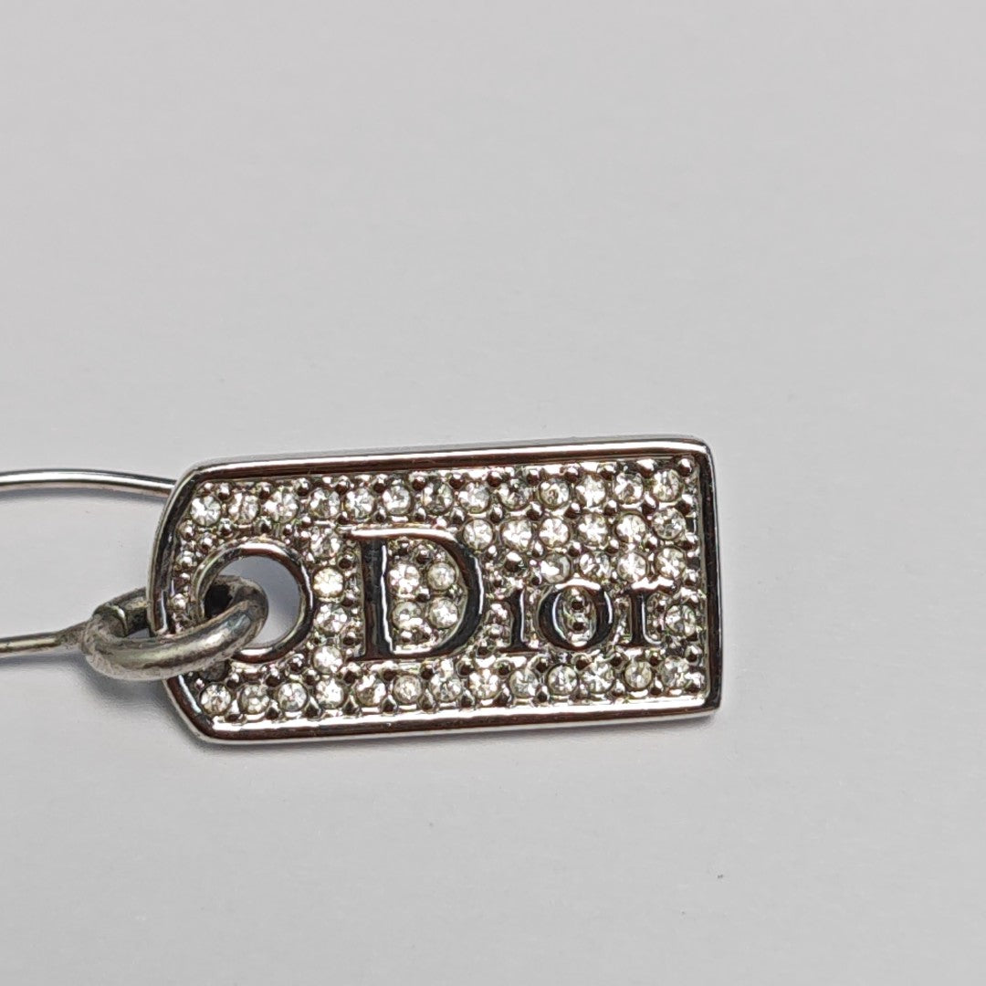 Authenticated pre-owned  Dog Tag Silver Tone Metal Synthetic Crystal Silver Earring - Earrings at Looply