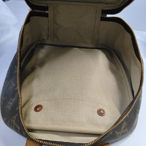 EXCURSION Monogram Coated Canvas Brown