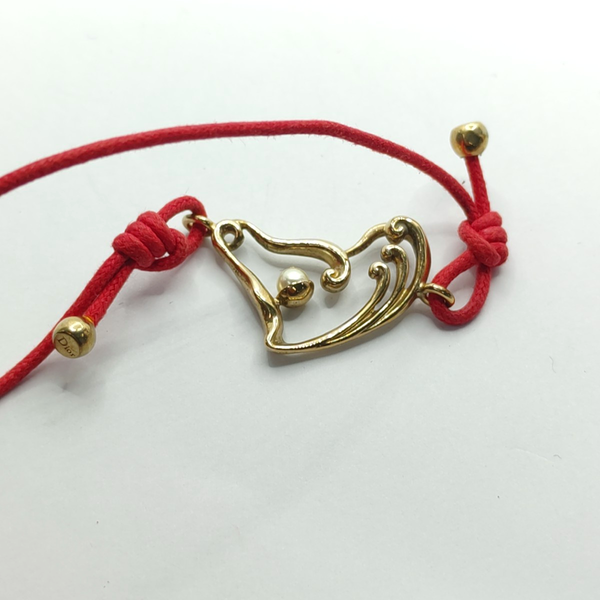 Pulsera roja de tela