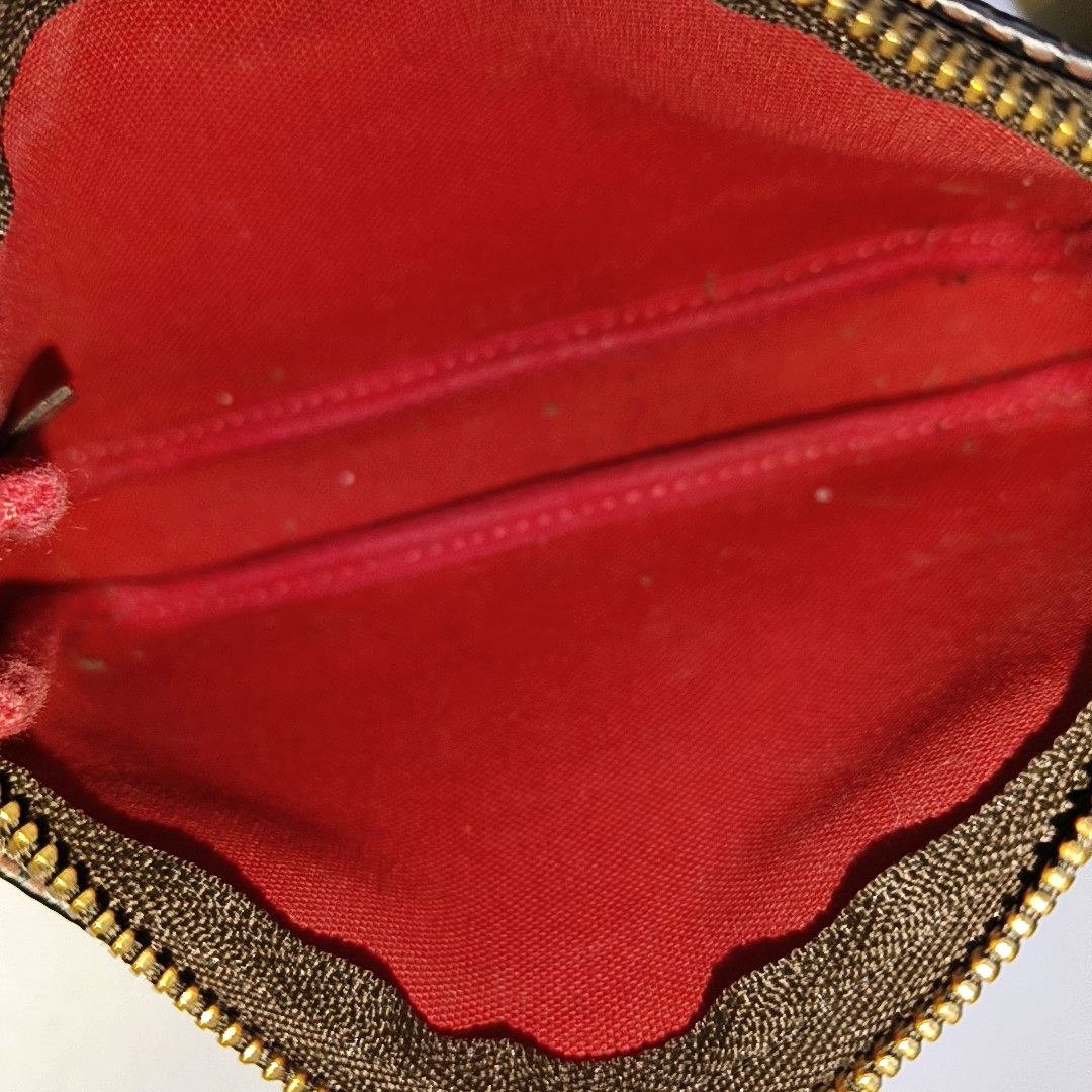 Authenticated pre-owned  ACCESSOIRES Mini Damier Ebene Coated Canvas Brown - Top Handle Bag at Looply
