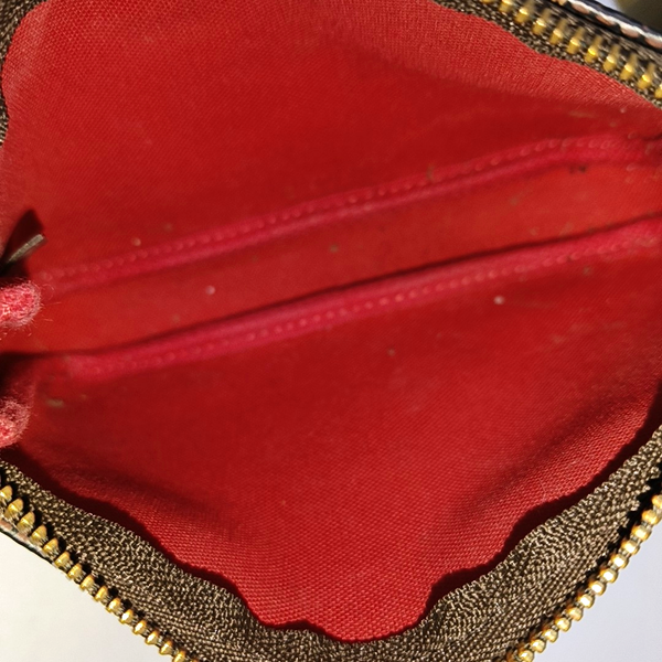 Authenticated pre-owned  ACCESSOIRES Mini Damier Ebene Coated Canvas Brown - Top Handle Bag at Looply