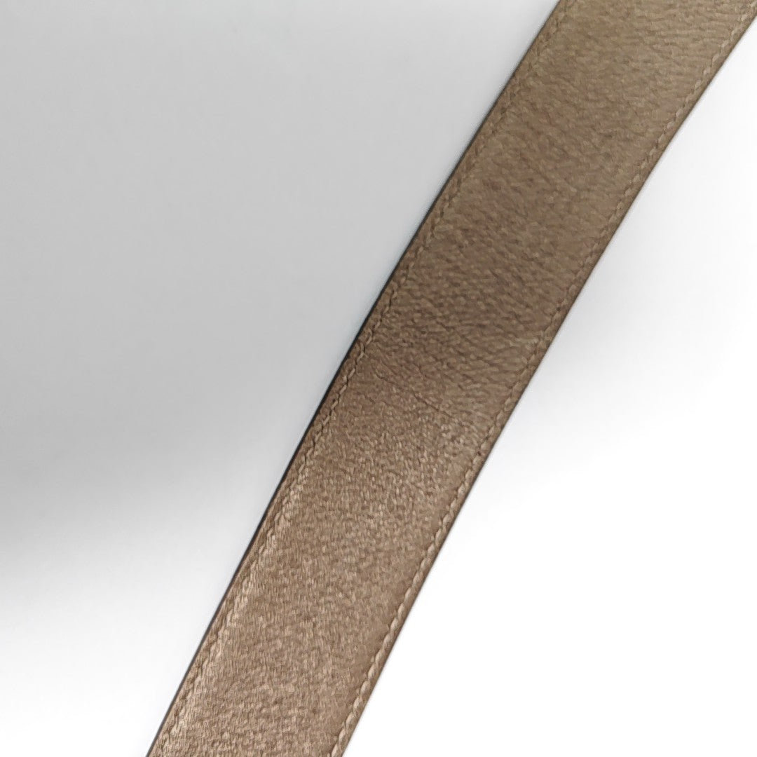 Cinturón de champaña de cuero
