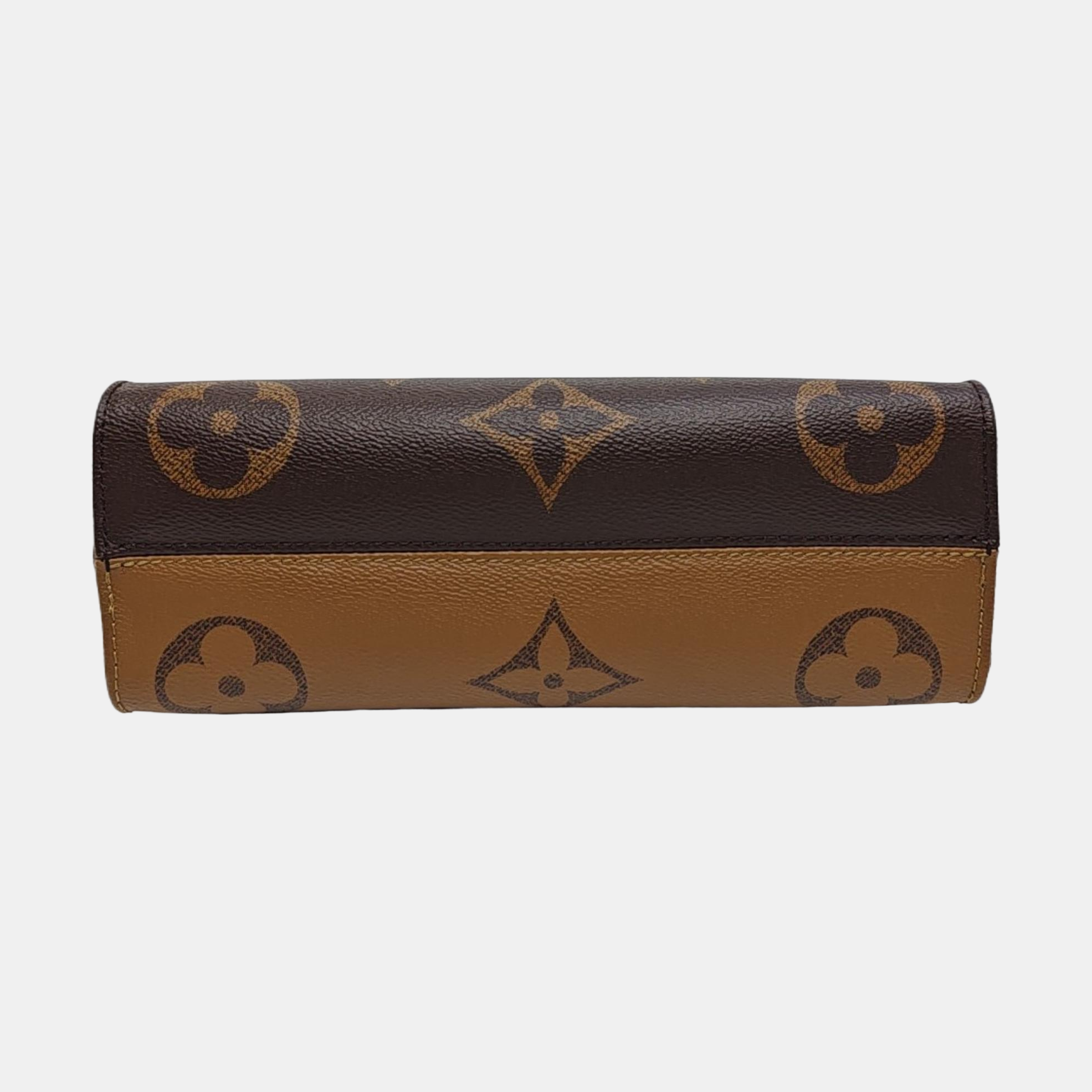ONTHEGO EAST WEST PM Monogram Coated Canvas Brown
