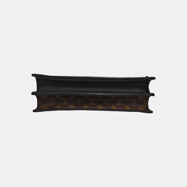 TRUNK Monogram Coated Canvas Brown