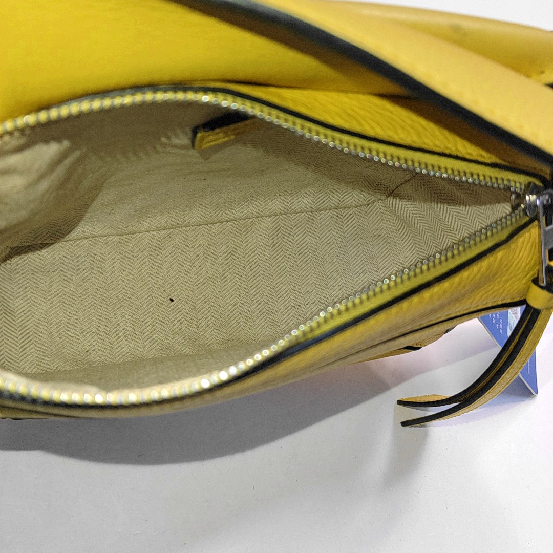 Authenticated pre-owned  Puzzle Mini Calfskin Yellow - Crossbody Bag at Looply