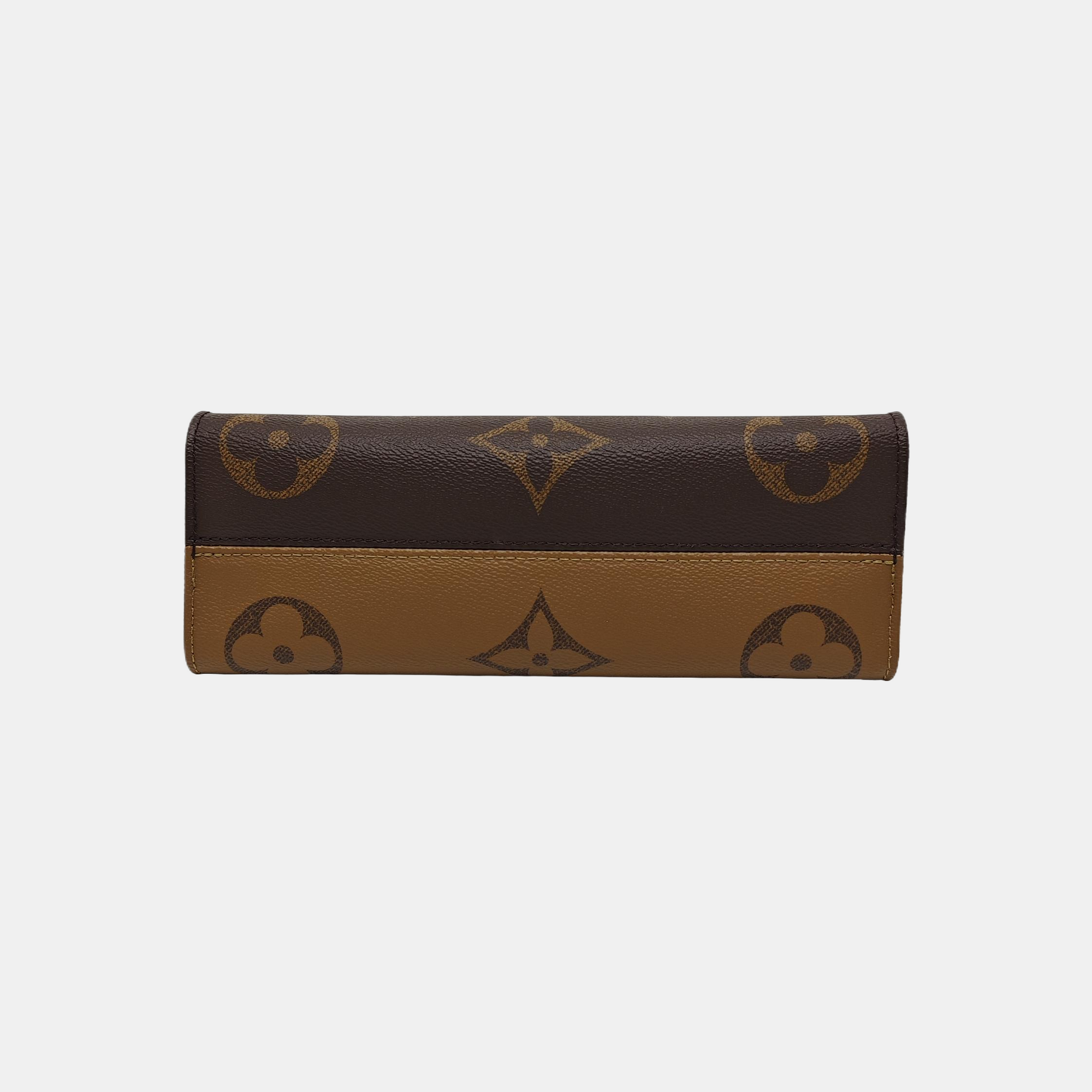 ONTHEGO EAST WEST PM Monogram Coated Canvas Brown
