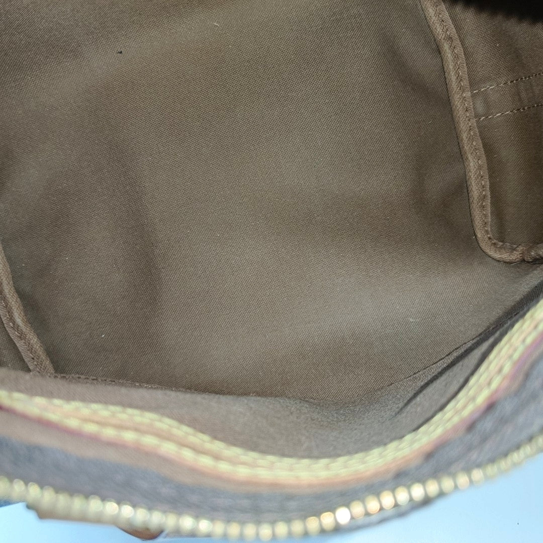 SPEEDY 25 Monogram Coated Canvas Brown