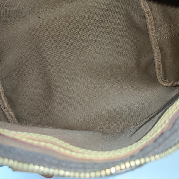 SPEEDY 25 Monogram Coated Canvas Brown