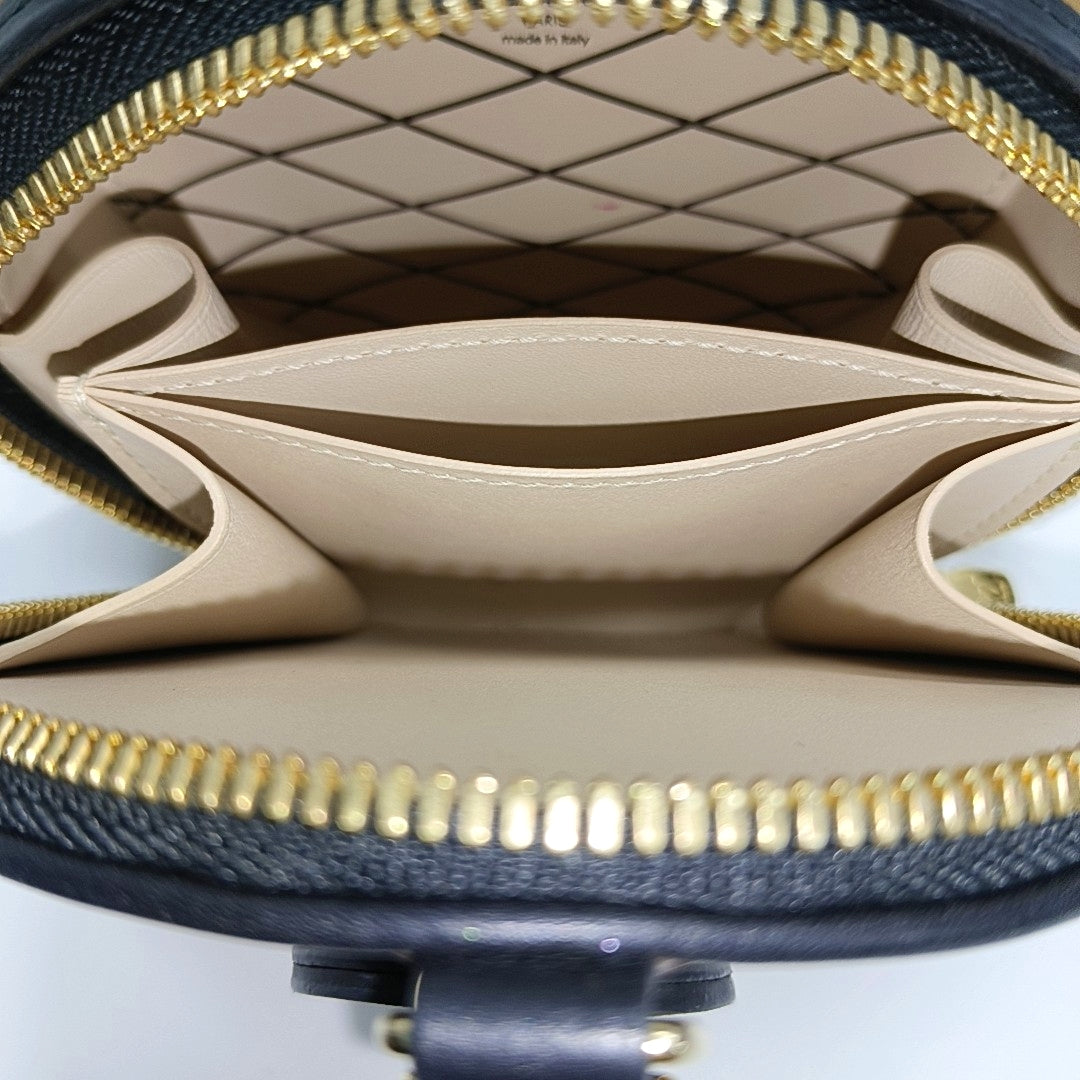 BOITE CHAPEAU Mini Monogram Coated Canvas Brown