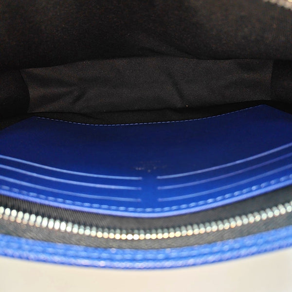 Pochette Voyag MM Monogram Coated Canvas Blue