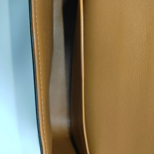 TRIOMPHE Small Coated Canvas Black