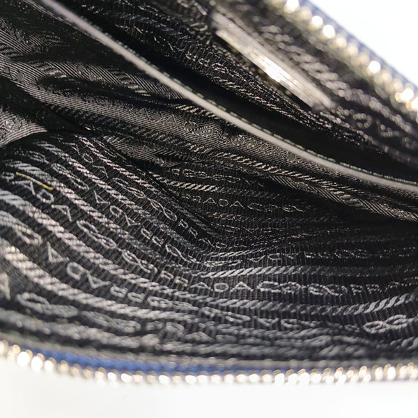 Authenticated pre-owned  Triangle Calfskin Blue - Crossbody Bag at Looply