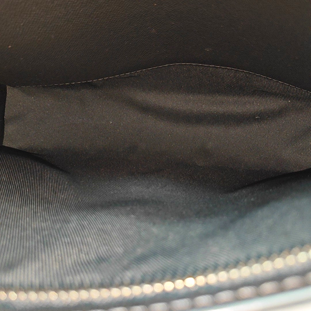 Pochette Voyag MM Monogram Coated Canvas Black