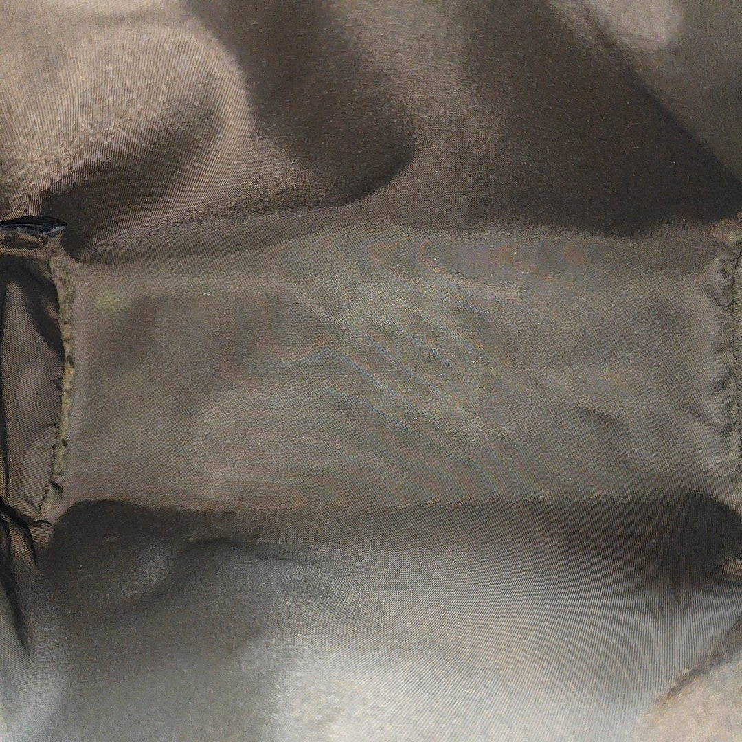 Monogram Coated Canvas Clutch Brown