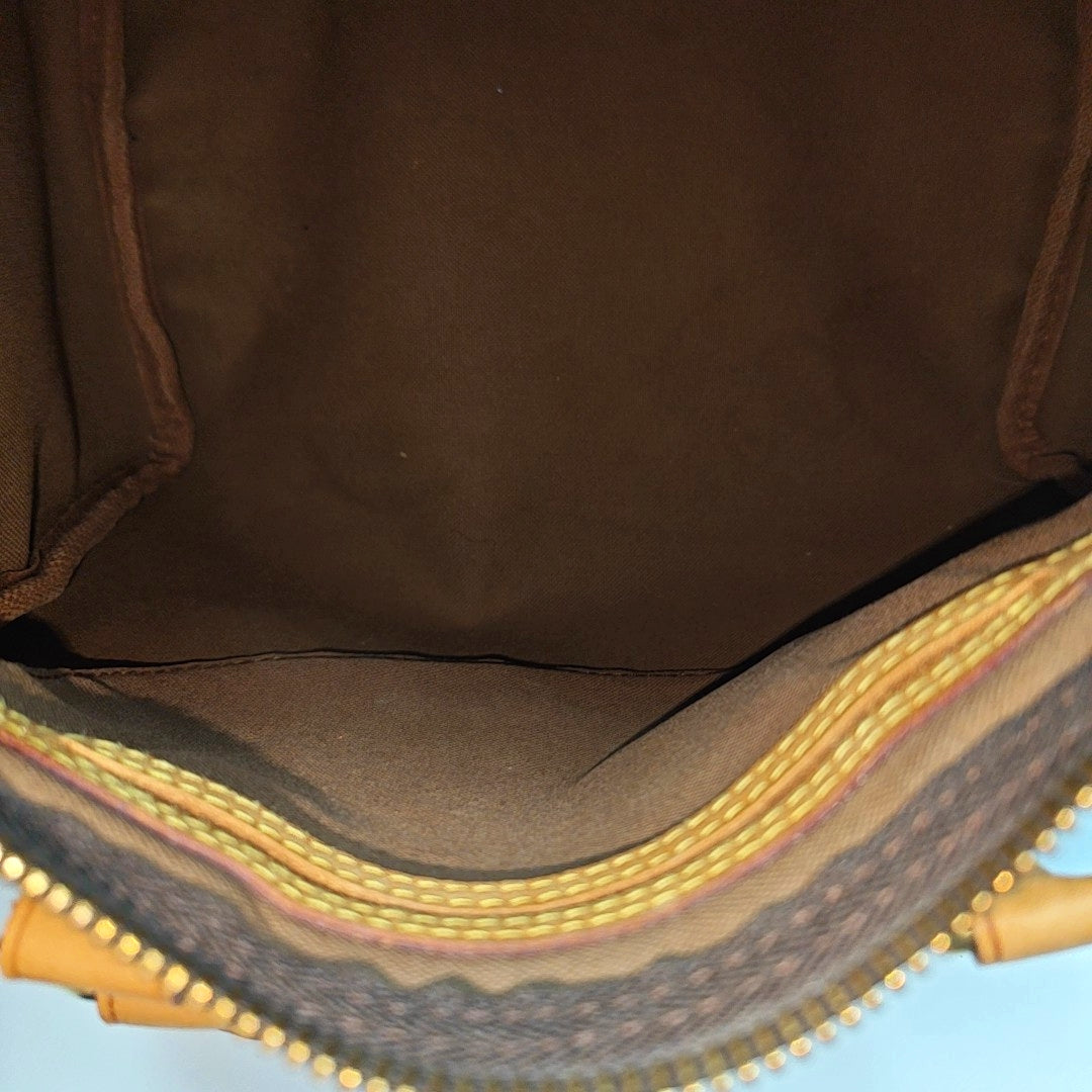 SPEEDY 25 Monogram Coated Canvas Brown