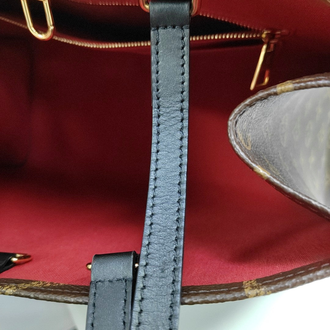 ONTHEGO MM Monogram Coated Canvas Brown