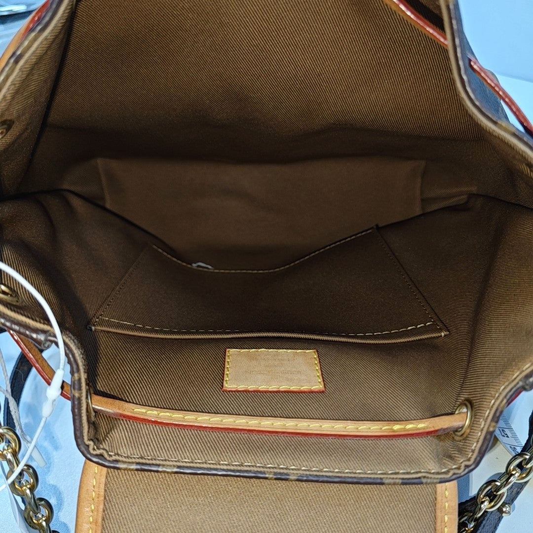 EXCURSION PM Monogram Coated Canvas Brown