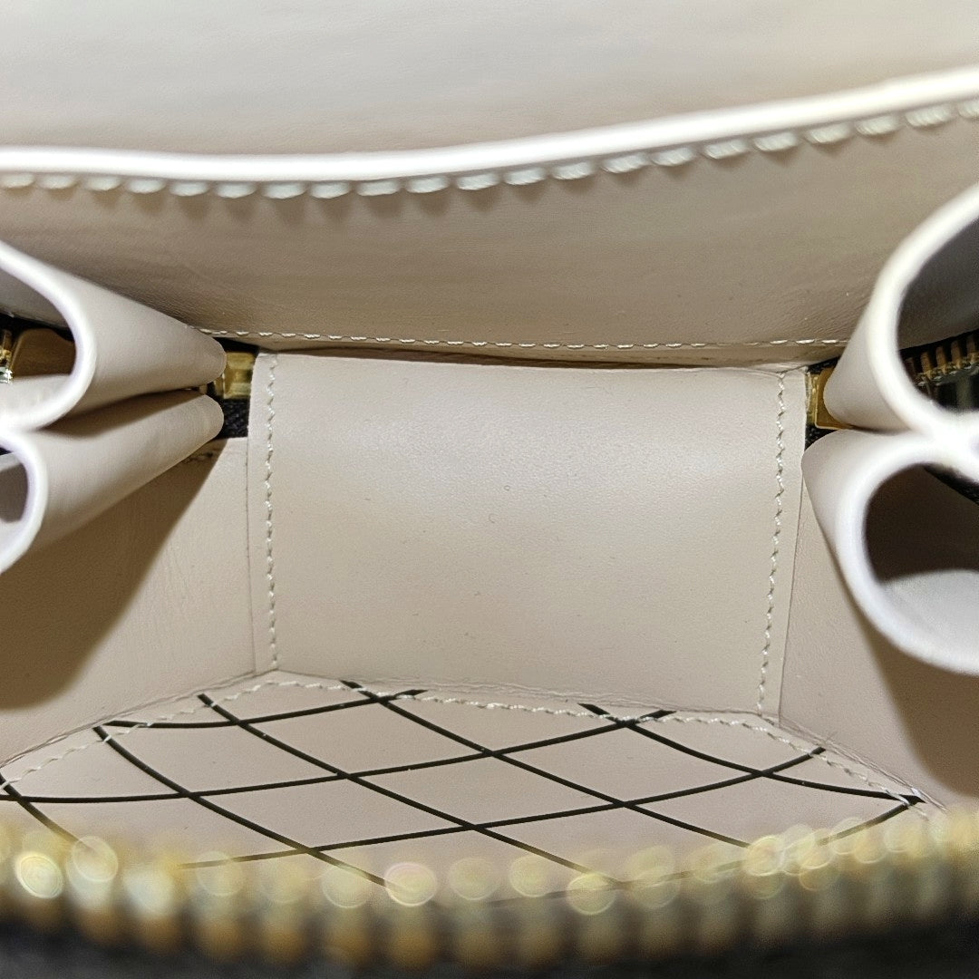 BOITE CHAPEAU Mini Monogram Coated Canvas Brown