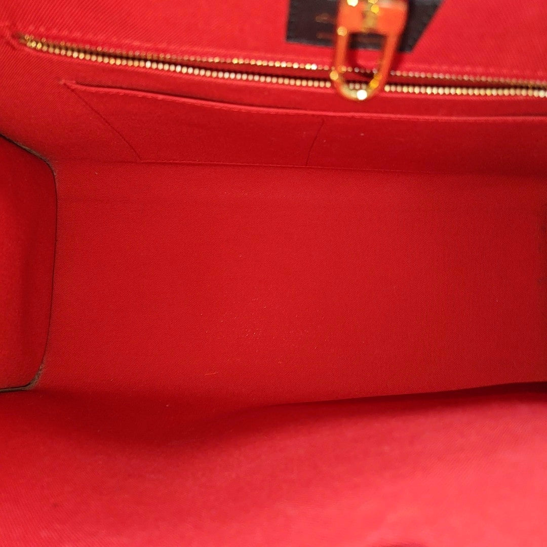 ONTHEGO MM Monogram Coated Canvas Brown