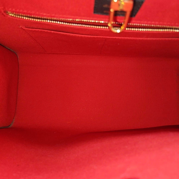 ONTHEGO MM Monogram Coated Canvas Brown