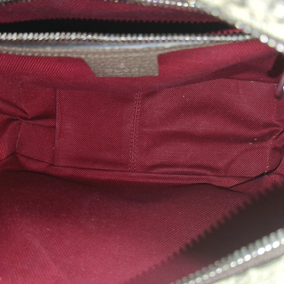 Trunk Monogram Coated Canvas Brown