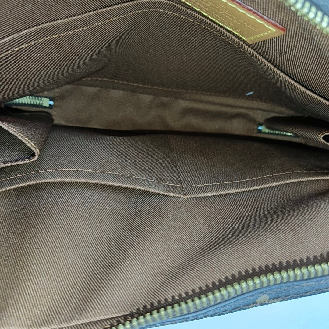 SOFT TRUNK PM Monogram Coated Canvas Brown