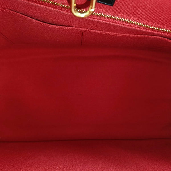 ONTHEGO MM Monogram Coated Canvas Brown